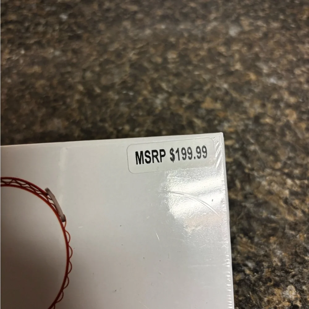 Smartwatch with i believe yellow band.